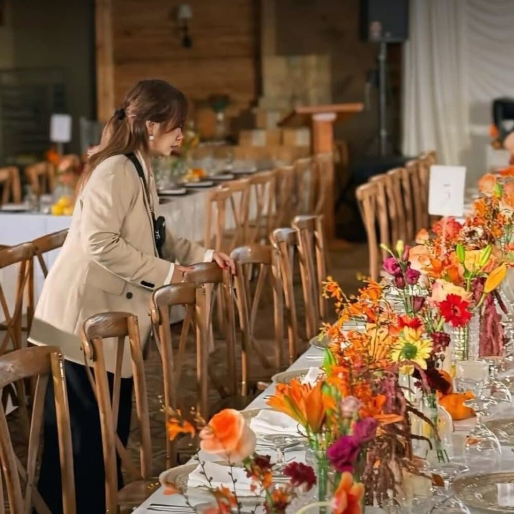 Jomai Arnaiz styling a long reception table at Expo 2026
