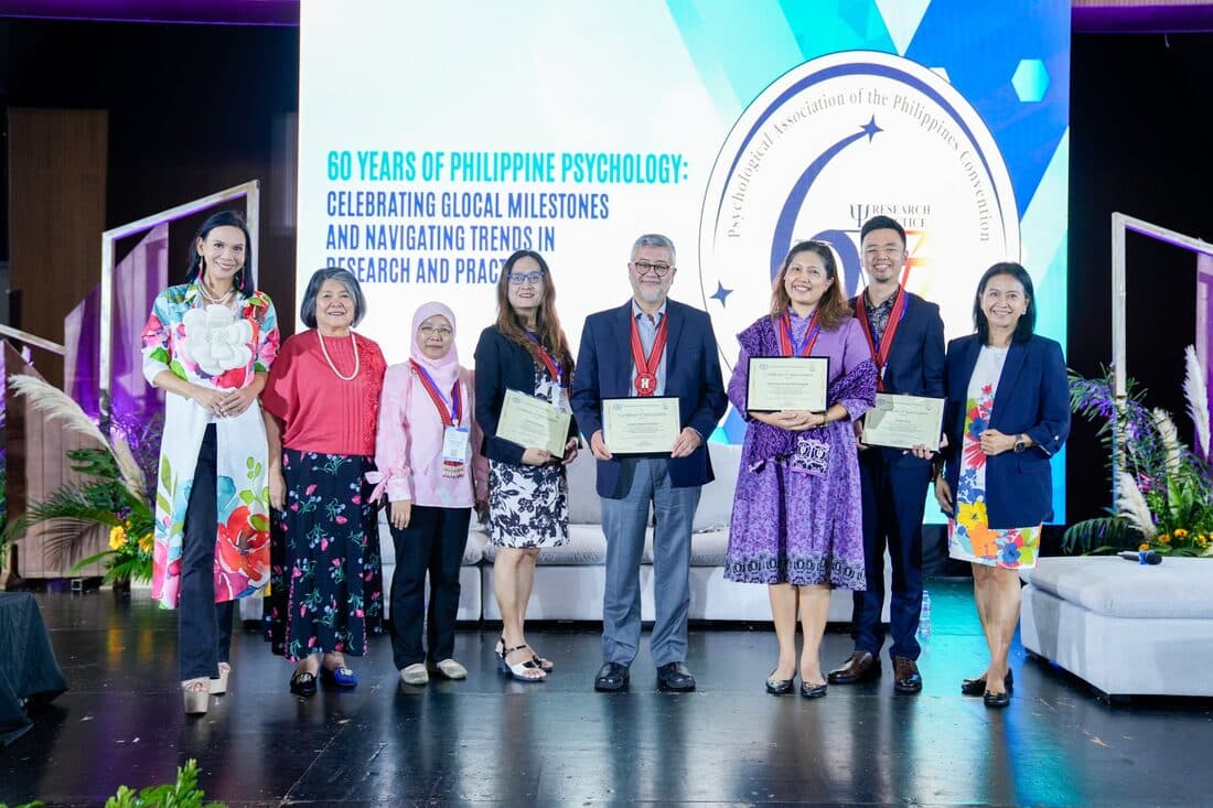 An awarding on stage at the anniversary convention