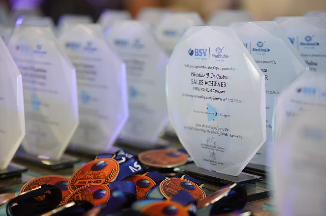 Engraved awards waiting on the table