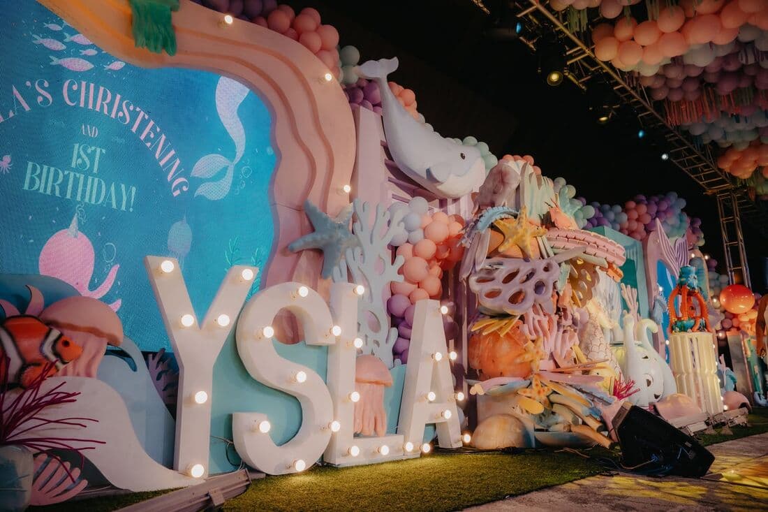 A mermaid-themed set for a christening and first birthday