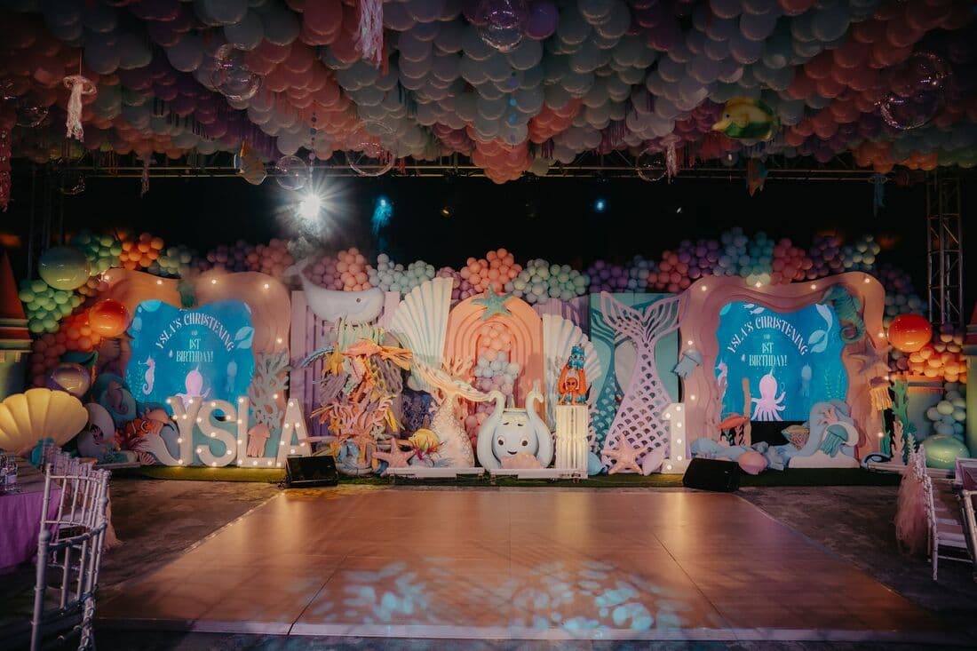 A pastel party stage before guests arrive