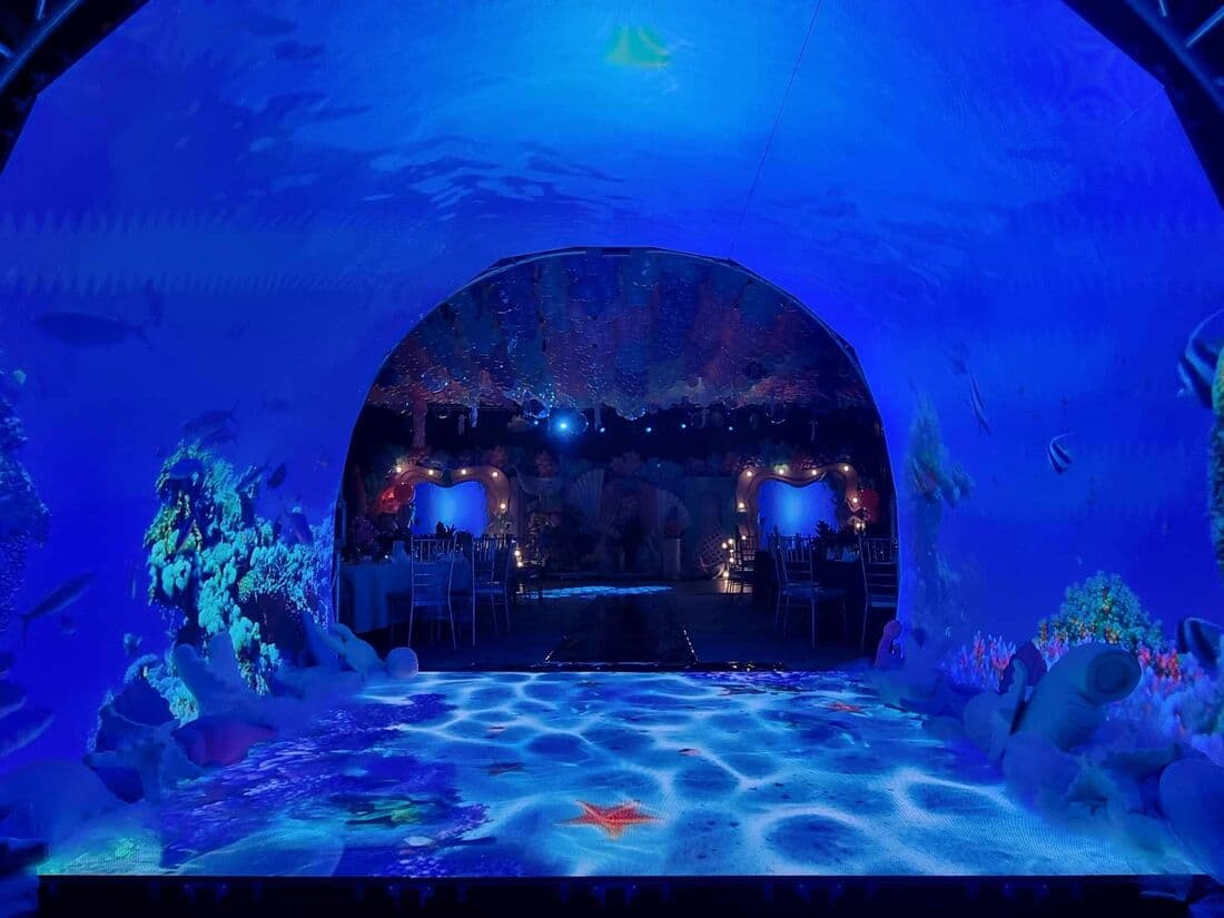 A stage lit blue for an underwater theme