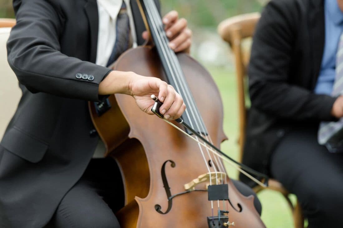 A cellist playing during the ceremony