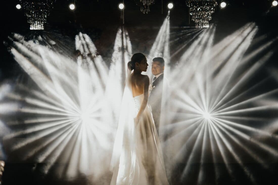 The couple in a burst of stage light