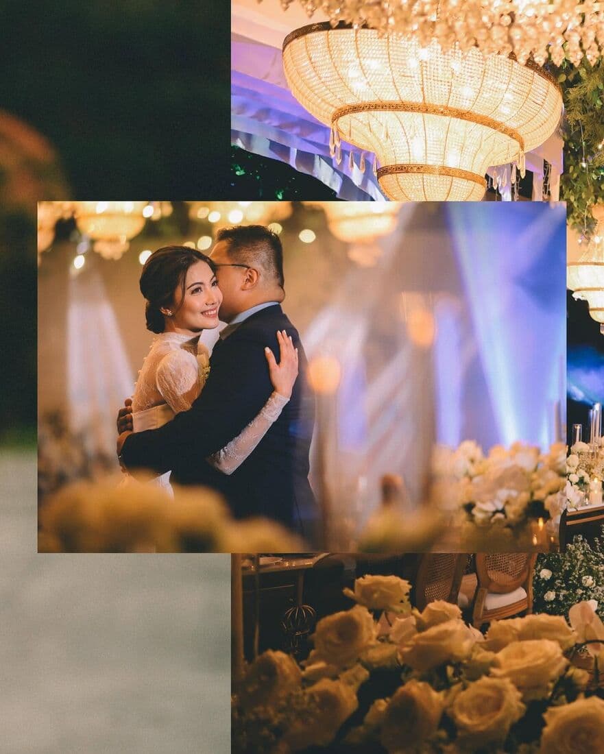 The couple dancing in a candlelit hall