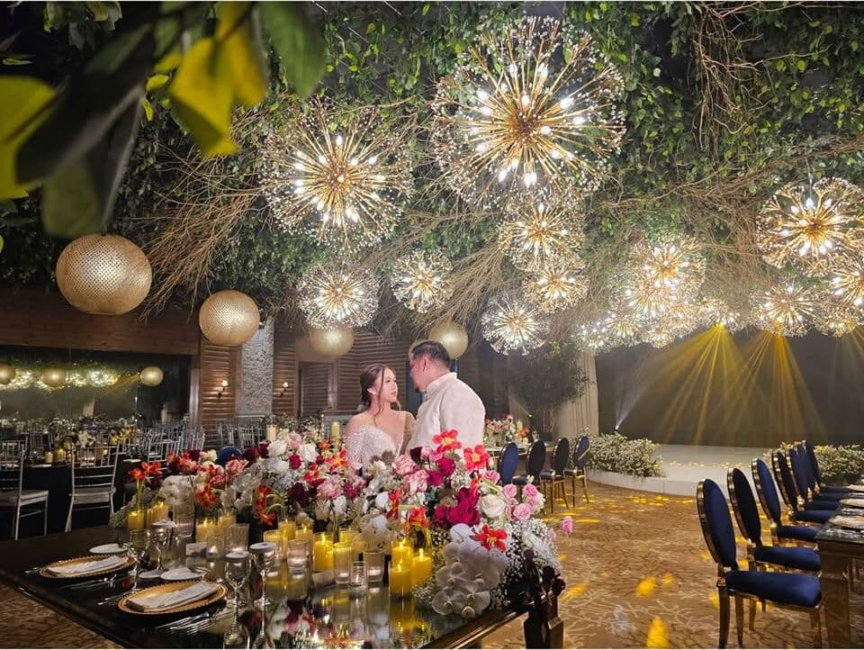 A reception under starburst lights