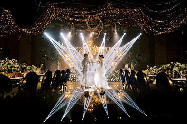 The couple in a burst of stage light