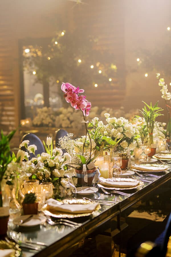 A tablescape of orchids and candlelight