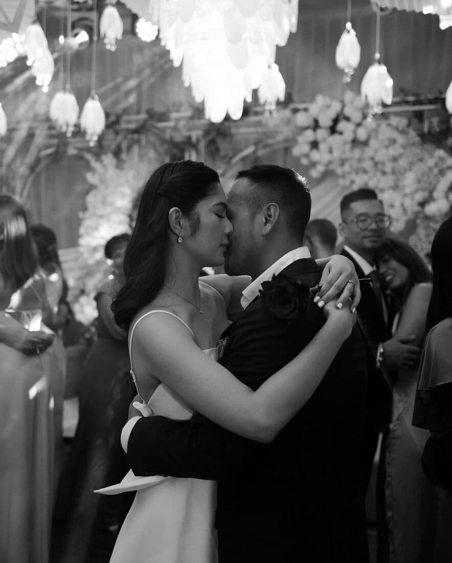 Black and white photograph of a couple's first dance