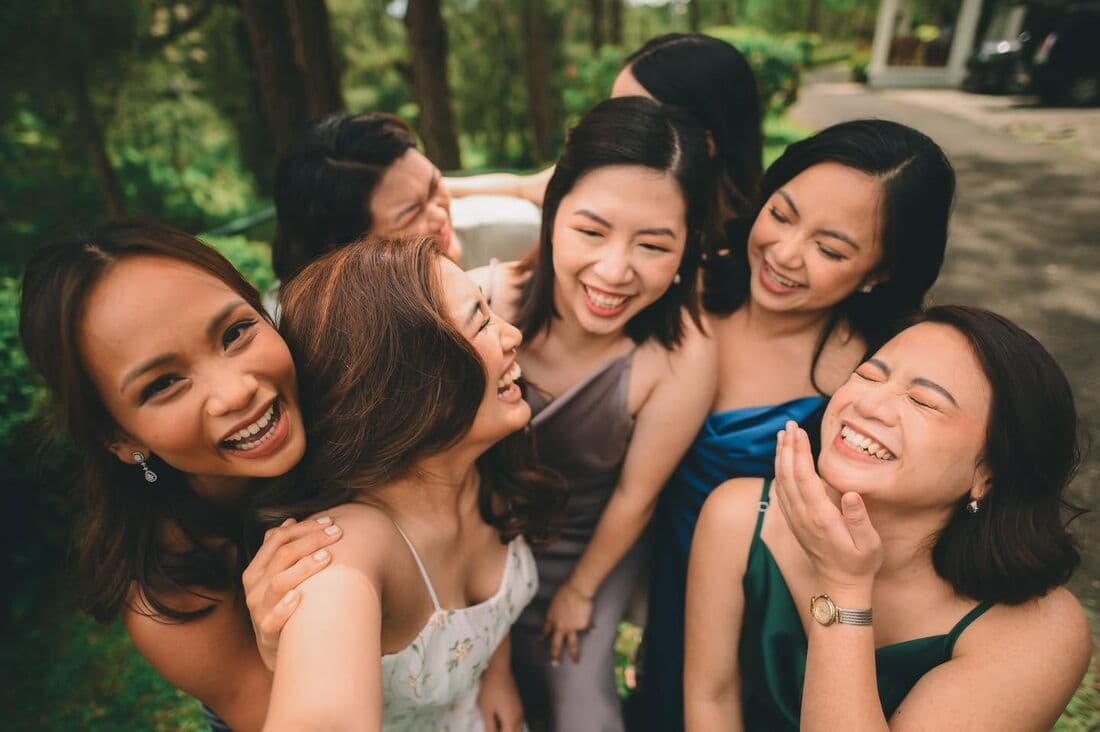Bridesmaids laughing together