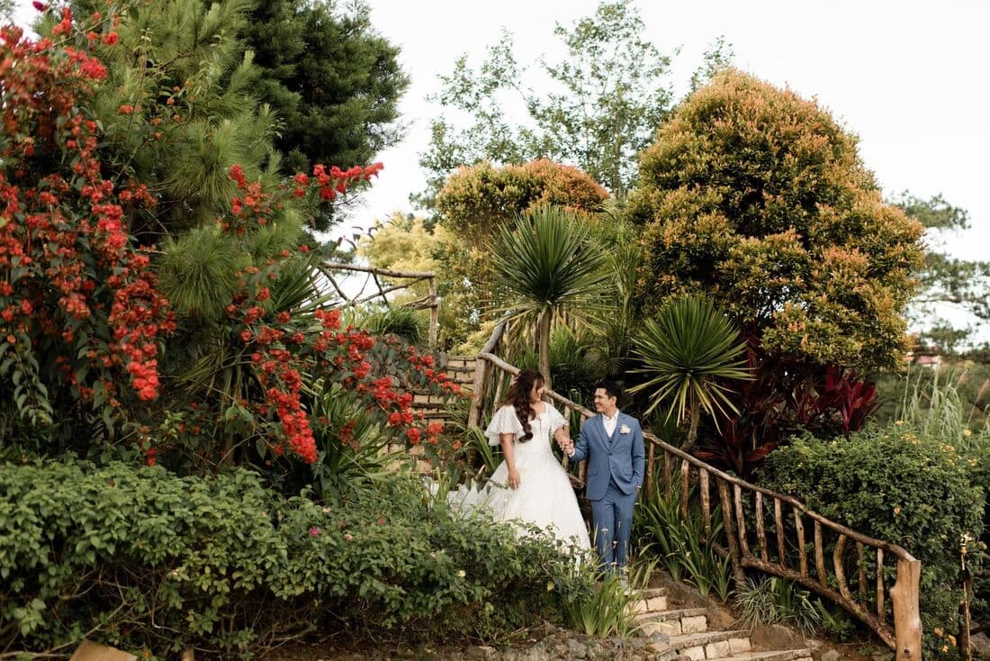 A couple on a garden footbridge