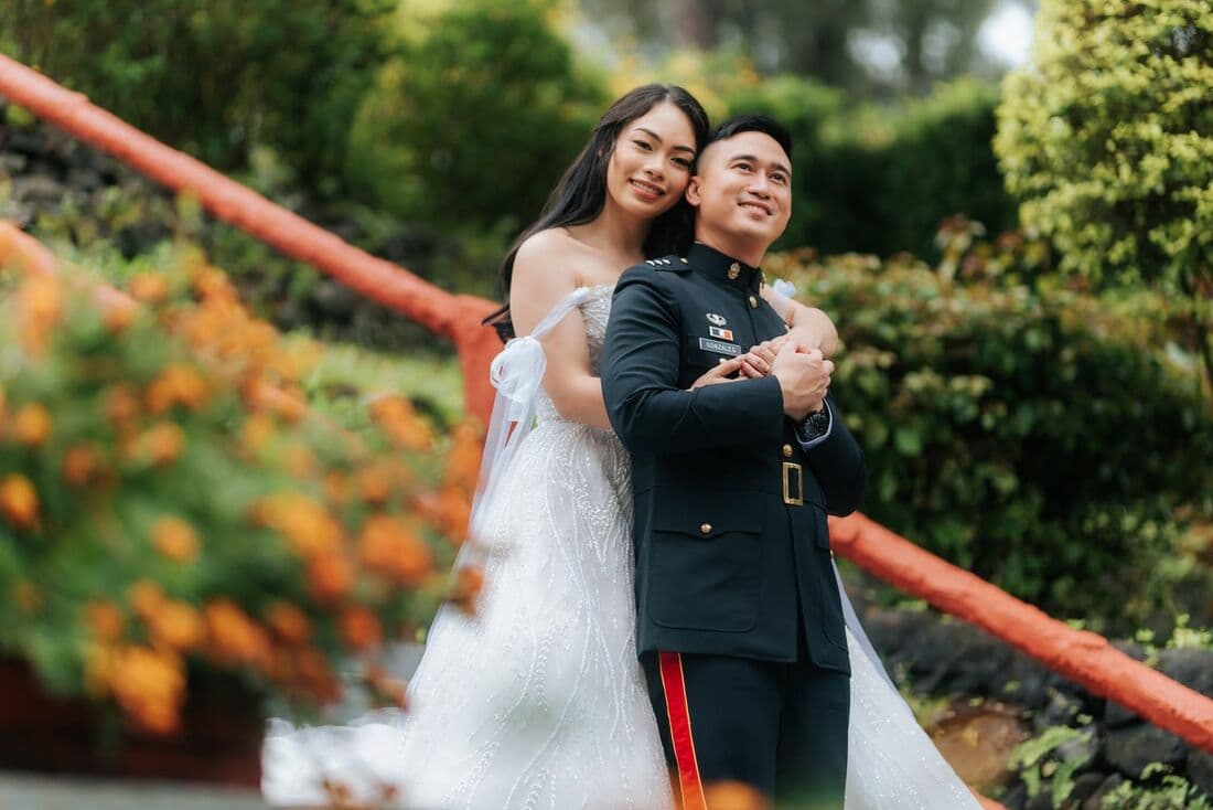 A couple in the garden, the groom in uniform