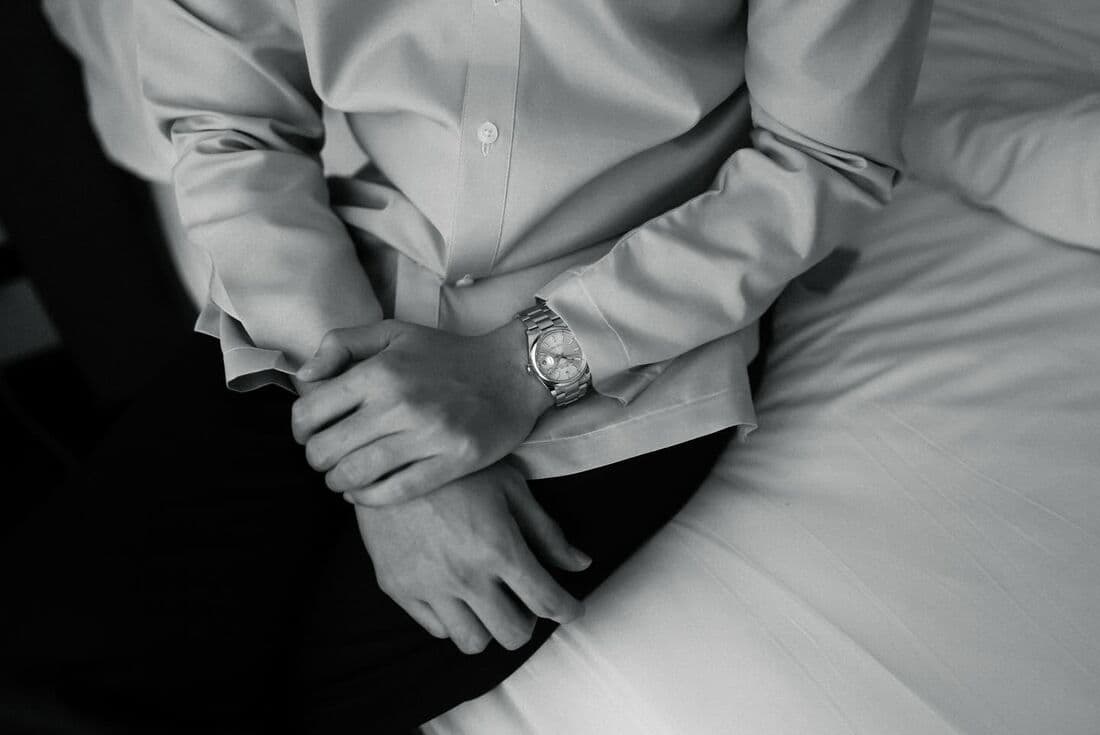 Black and white detail of the couple's hands