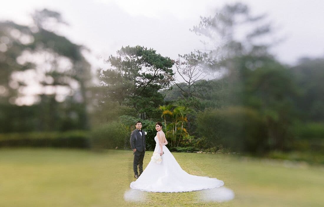A bride alone in a wide landscape