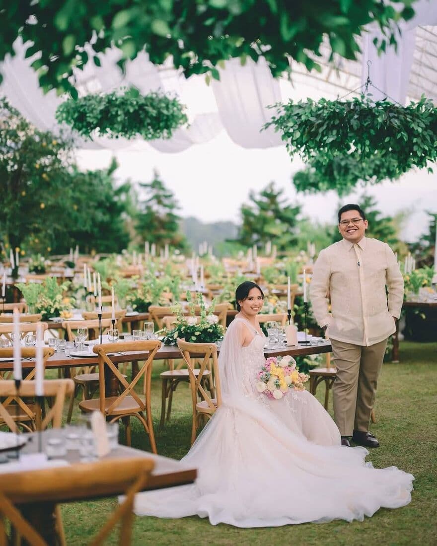 A bride at a garden table