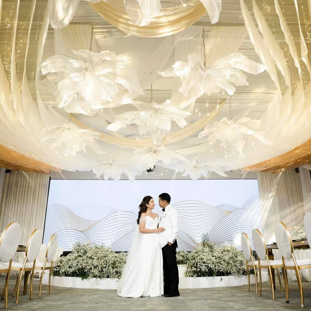 A couple in a modern chapel