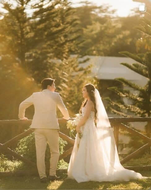A couple walking into the woods
